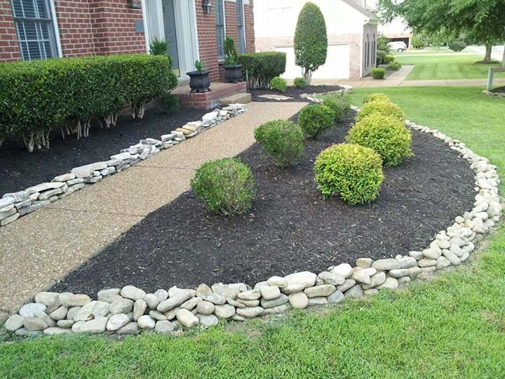 stone garden with small hedges